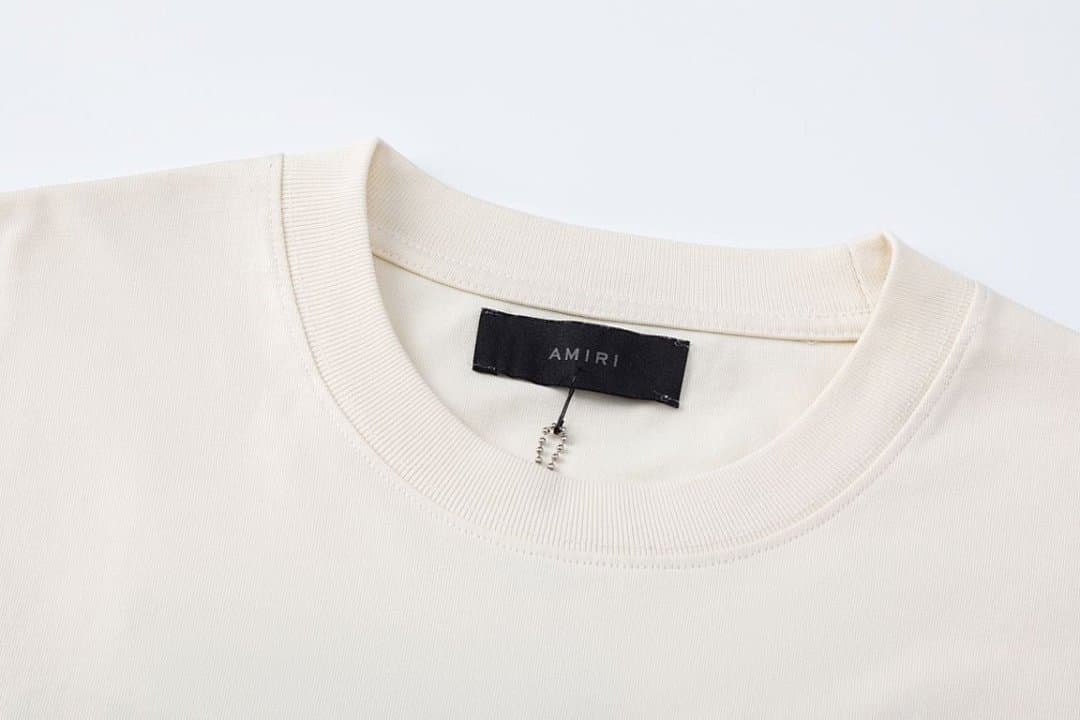 T-Shirt AMIRI com Logo Patch Bordado foto 01