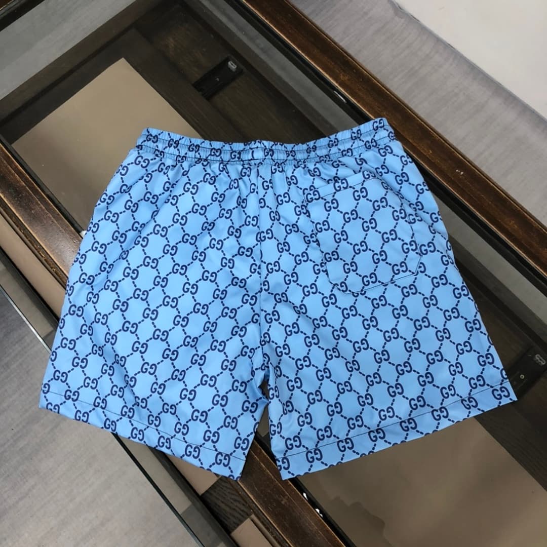 Calções Praia Gucci Monograma Azul-Violeta foto 05