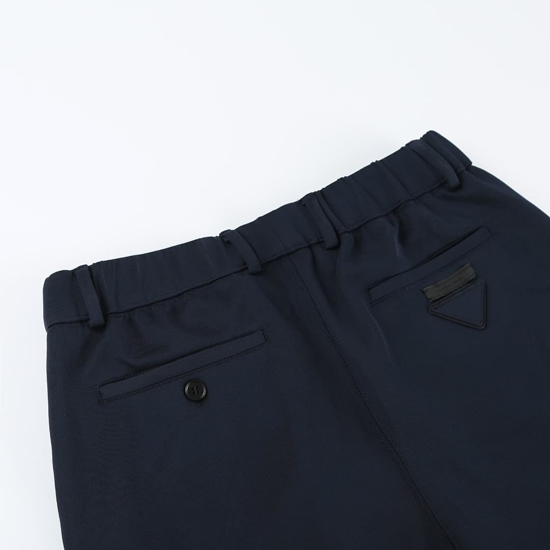 Prada Triangle Patch Trousers foto 07