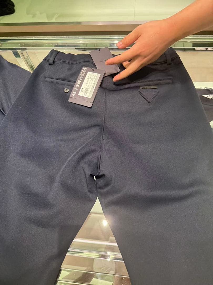 Prada Triangle Patch Trousers foto 22
